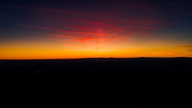 Naposzlop a tüzes naplementében