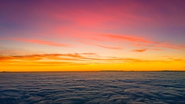 Köd feletti naplemente