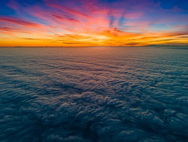 Aranyló ködtakaró naplementében