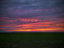Kibontakozó Kelvin–Helmholtz hullámok a novemberi naplementében